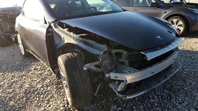 2023 Tesla Model Y VIN: 7SAYGDEE1PF921233 Lot: 85536755