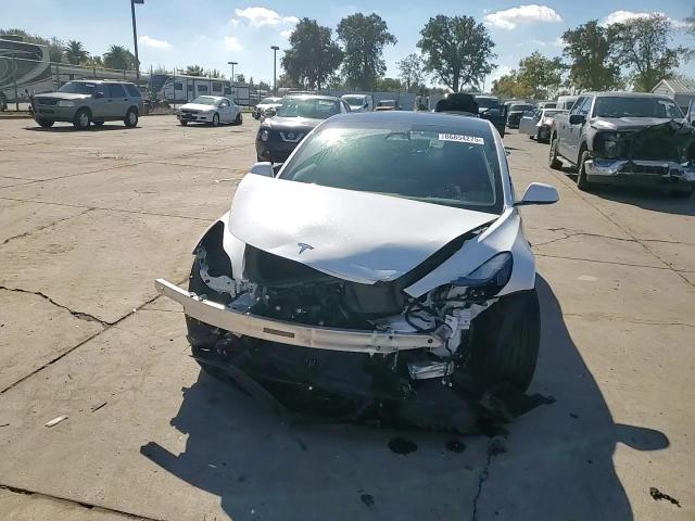 2023 Tesla Model 3 VIN: 5YJ3E1EA9PF705557 Lot: 86854275