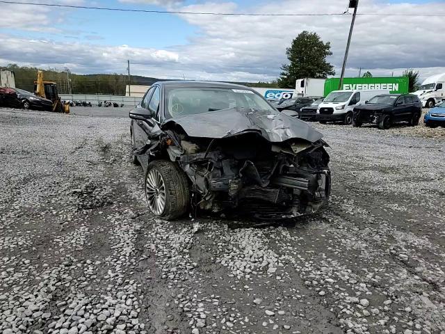 2014 Ford Fusion Titanium VIN: 3FA6P0K95ER299838 Lot: 85704225