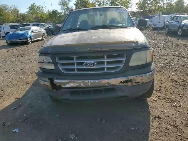 2002 Ford F150 VIN: 1FTRF18202NB70186 Lot: 82221575