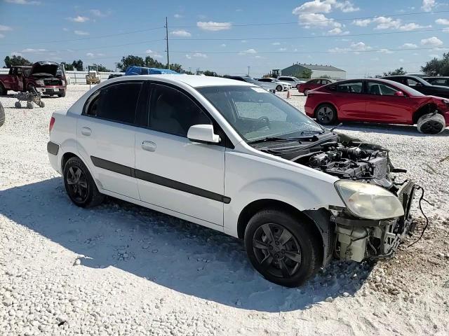 2007 Kia Rio Base VIN: KNADE123576210520 Lot: 82390255
