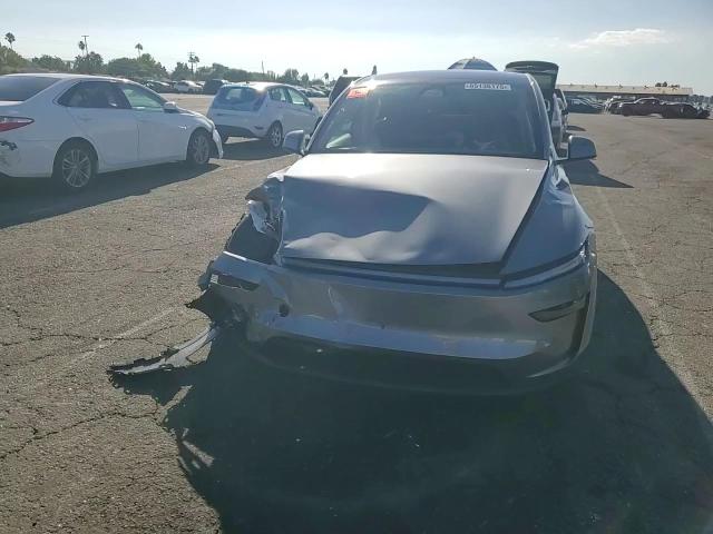 2026 Tesla Model Y VIN: 7SAYGDEE9TF373296 Lot: 85136175