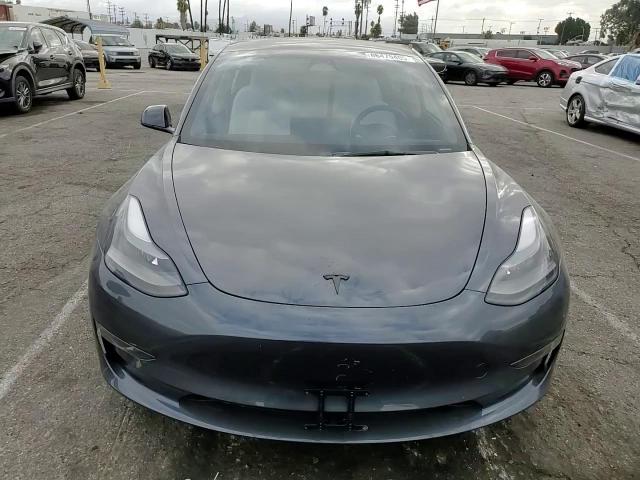 2023 Tesla Model 3 VIN: 5YJ3E1EA7PF561698 Lot: 86475405