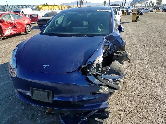 2022 Tesla Model 3 VIN: 5YJ3E1EAXNF358057 Lot: 90655875