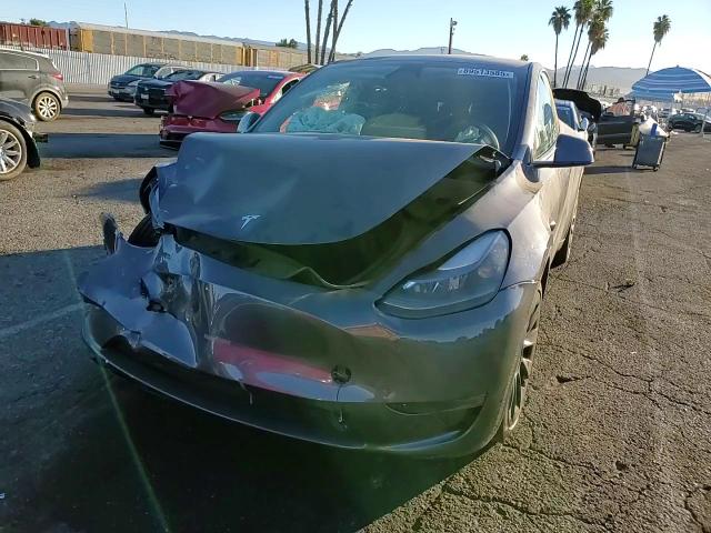 2023 Tesla Model Y VIN: 7SAYGDEE9PF855613 Lot: 89513585
