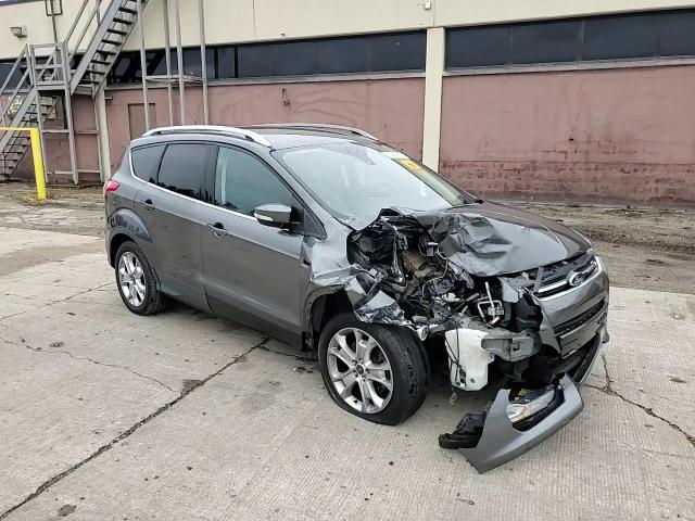 2016 Ford Escape Titanium VIN: 1FMCU0J96GUB91100 Lot: 82514625