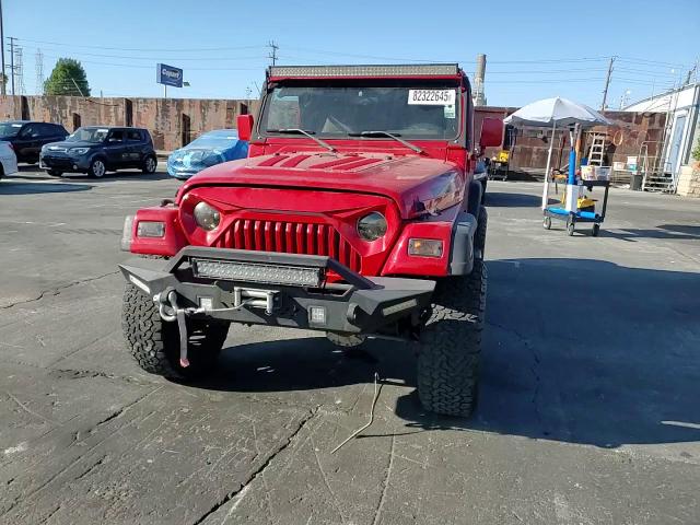 2000 Jeep Wrangler / Tj Sport VIN: 1J4FA49S9YP760265 Lot: 82322645