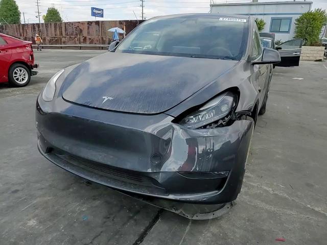 2024 Tesla Model Y VIN: 7SAYGDEE0RA231036 Lot: 87465575