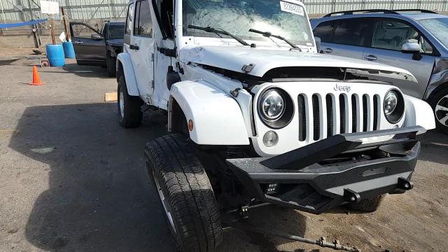 2014 Jeep Wrangler Unlimited Sahara VIN: 1C4BJWEG3EL220155 Lot: 82394035