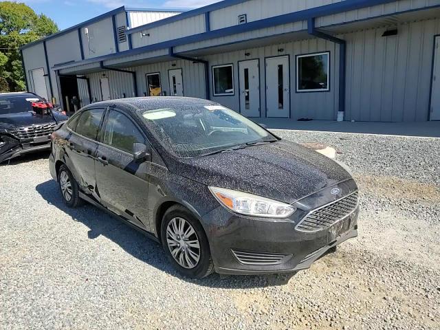 2017 Ford Focus S VIN: 1FADP3E23HL221097 Lot: 82450025