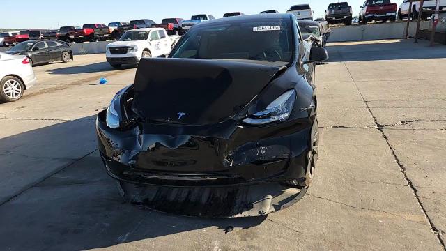 2023 Tesla Model Y VIN: 7SAYGDEE7PA024141 Lot: 82641495