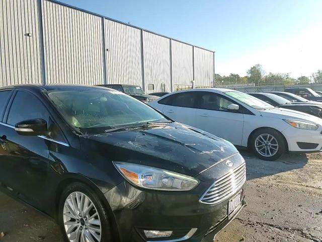 2016 Ford Focus Titanium VIN: 1FADP3J21GL245807 Lot: 85719655