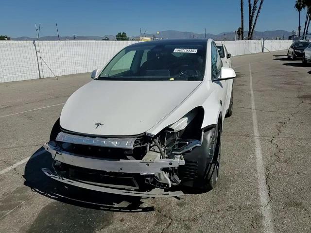 2023 Tesla Model Y VIN: 7SAYGDEF0PF606013 Lot: 90315335