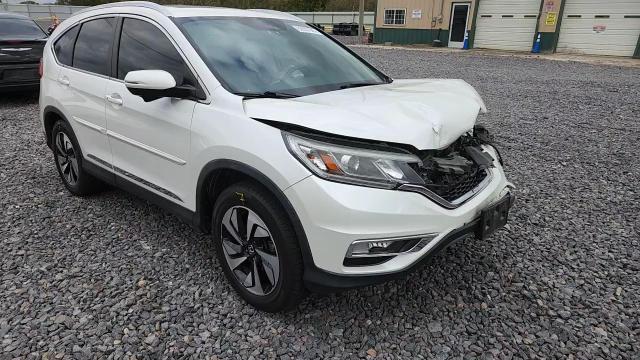 2016 Honda Cr-V Touring VIN: 5J6RM4H91GL101783 Lot: 82657945