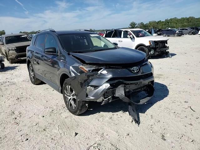 2017 Toyota Rav4 Le VIN: JTMBFREVXHD210657 Lot: 82184535