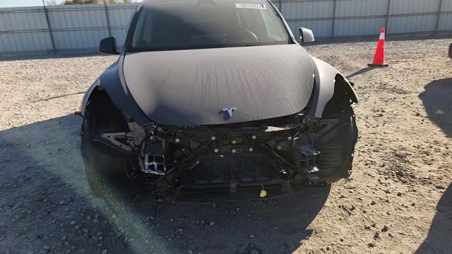 2023 Tesla Model Y VIN: 7SAYGDEEXPA210143 Lot: 82728245