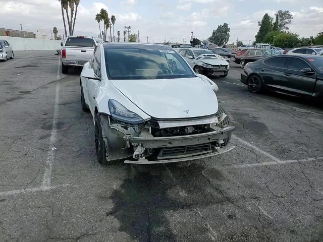 2020 Tesla Model Y VIN: 5YJYGDEEXLF050307 Lot: 86093245