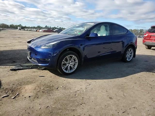 2023 Tesla Model Y VIN: 7SAYGDEE3PF799457 Lot: 82439205