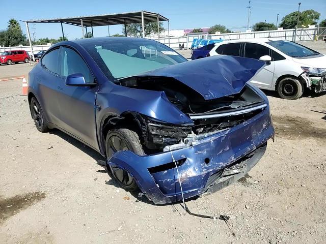 2026 Tesla Model Y VIN: 7SAYGDEE9TF415126 Lot: 84773195