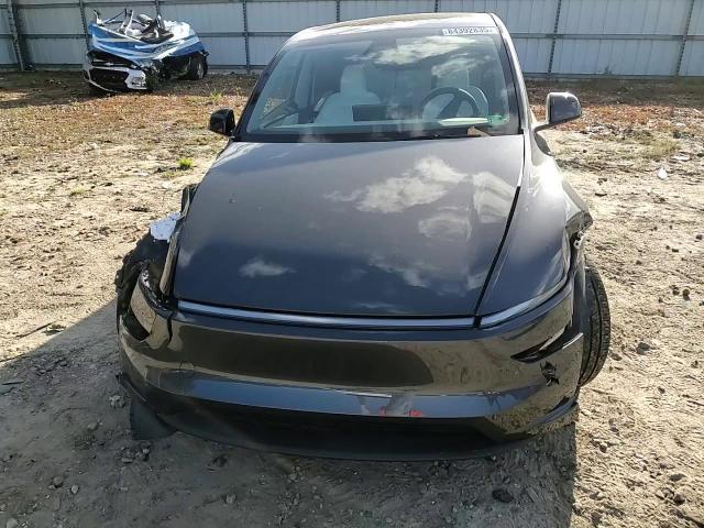 2026 Tesla Model Y VIN: 7SAYGDED7TA433015 Lot: 84392835