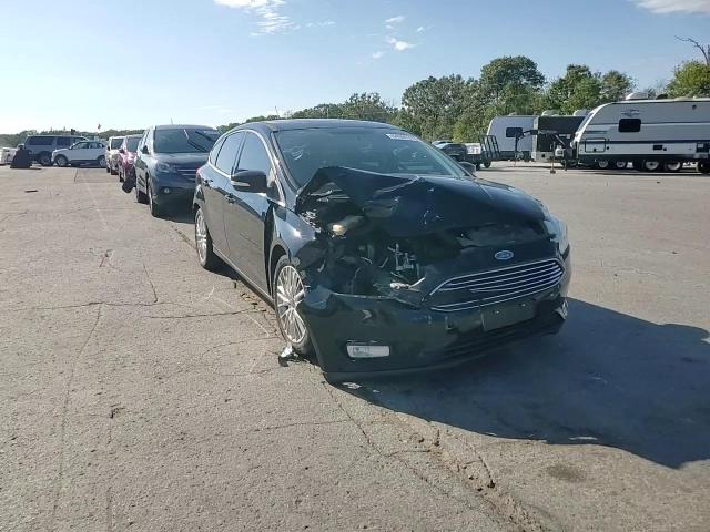 2017 Ford Focus Titanium VIN: 1FADP3N2XHL204765 Lot: 84995315