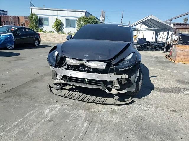 2023 Tesla Model Y VIN: 7SAYGDEE7PA193107 Lot: 89488835