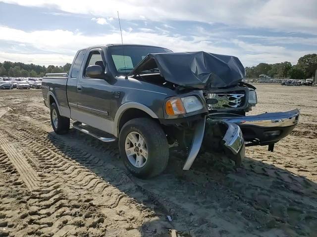 2002 Ford F150 VIN: 1FTRX18L52NA74799 Lot: 84649055