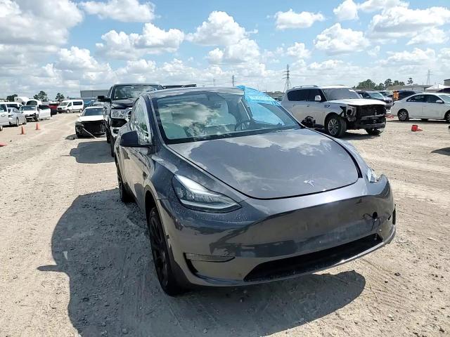 2023 Tesla Model Y VIN: 7SAYGDEEXPF609766 Lot: 85840595