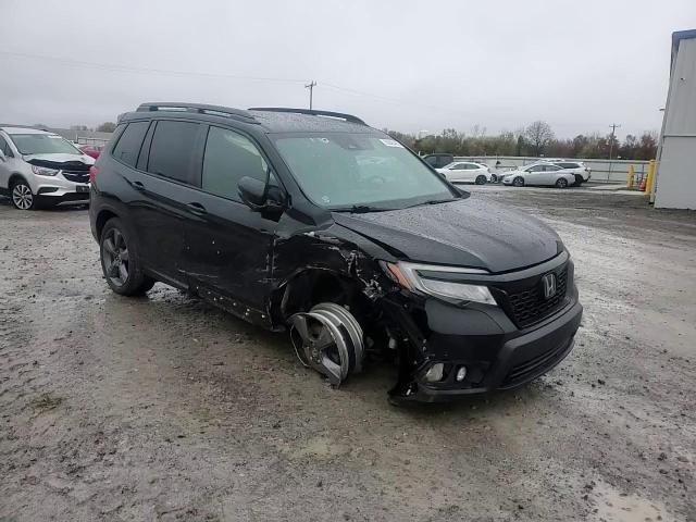 2019 Honda Passport Touring VIN: 5FNYF8H9XKB010610 Lot: 90540495