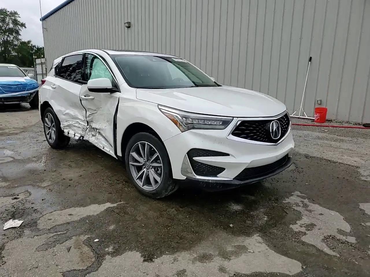 Фото: 5J8TC2H59LL029758