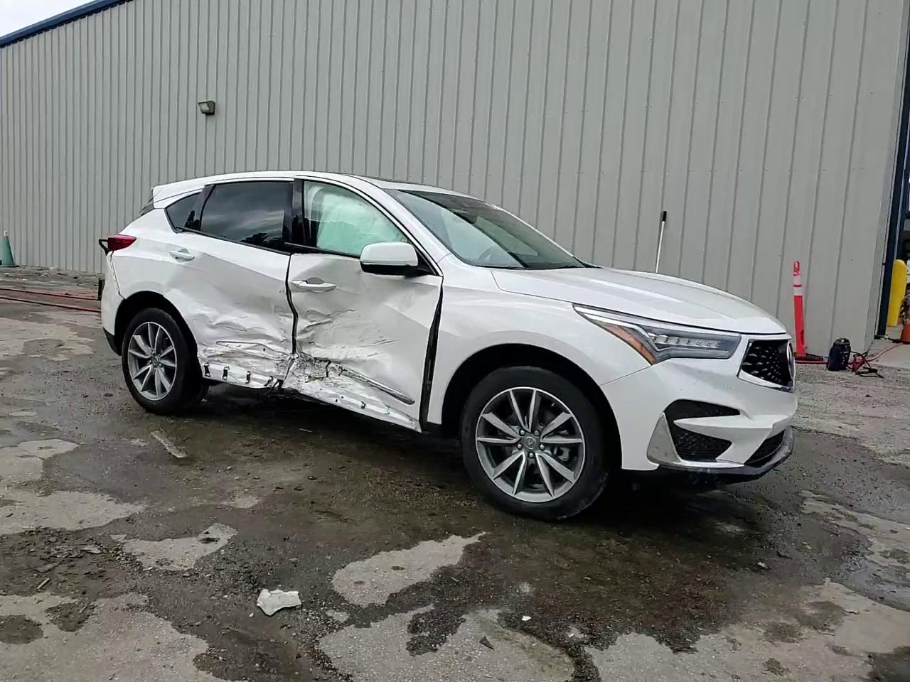 Фото: 5J8TC2H59LL029758