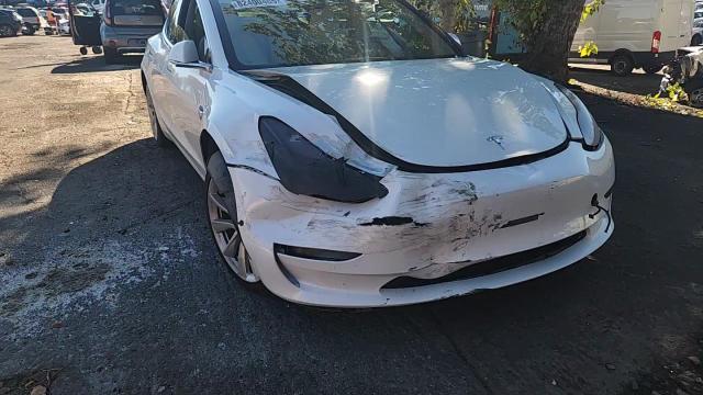 2018 Tesla Model 3 VIN: 5YJ3E1EA4JF169480 Lot: 82400465