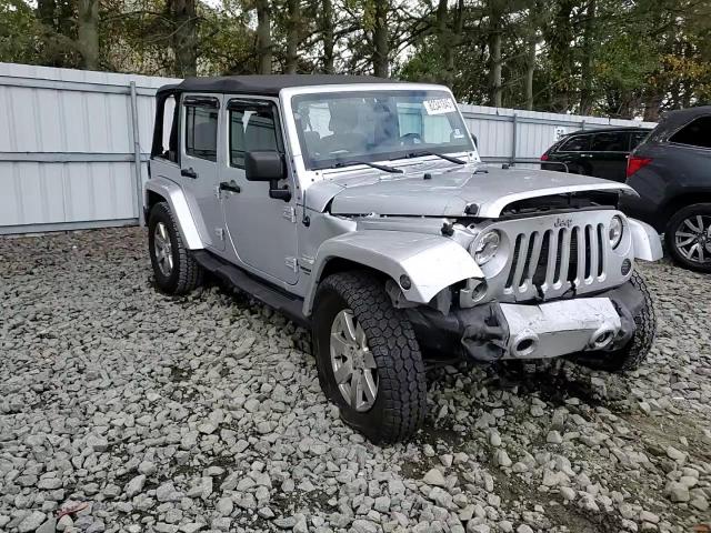 2012 Jeep Wrangler Unlimited Sahara VIN: 1C4HJWEG0CL110526 Lot: 82341845