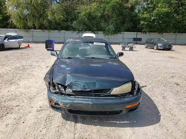 1995 Toyota Camry Le VIN: 4T1SK12E9SU502711 Lot: 85540835