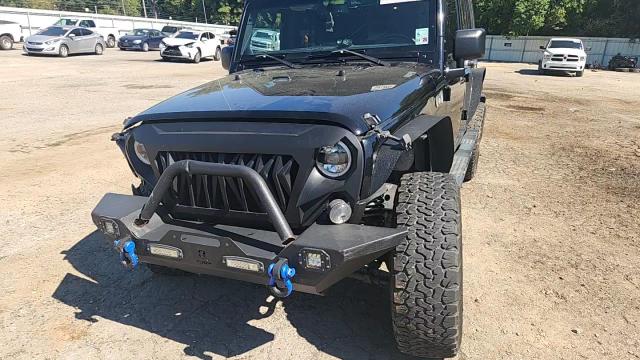 2014 Jeep Wrangler Unlimited Sport VIN: 1C4BJWDGXEL218839 Lot: 86136835