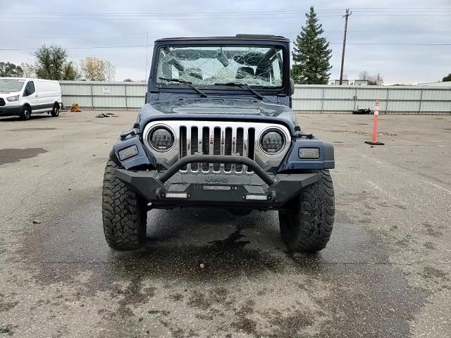 2005 Jeep Wrangler / Tj Unlimited VIN: 1J4FA44S15P302500 Lot: 86073725