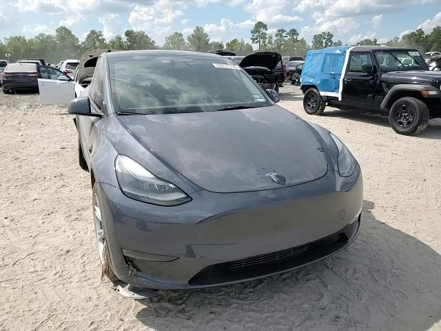 2023 Tesla Model Y VIN: 7SAYGDEE3PA187692 Lot: 82221735