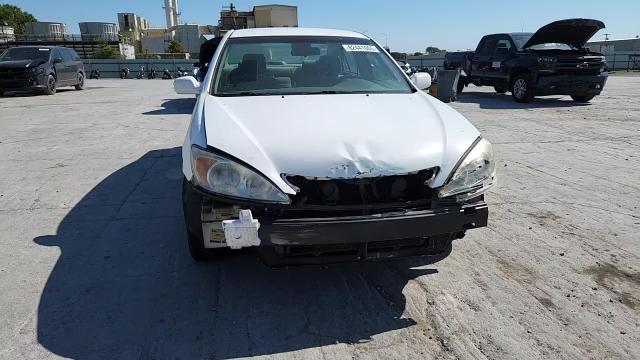 2002 Toyota Camry Le VIN: 4T1BE32K02U023165 Lot: 82441005