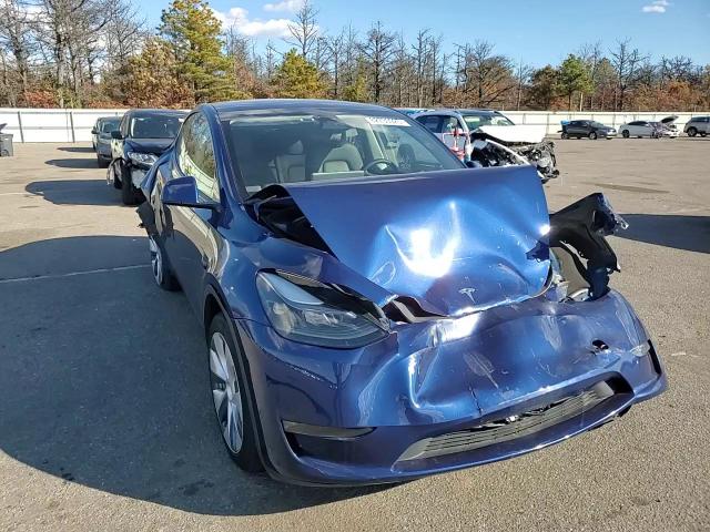 2023 Tesla Model Y VIN: 7SAYGDEEXPA211843 Lot: 82739925