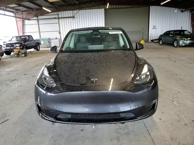 2025 Tesla Model Y VIN: 7SAYGDEE5SF285165 Lot: 84231255