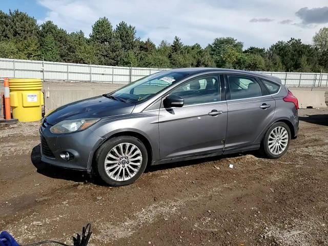 2012 Ford Focus Titanium VIN: 1FAHP3N24CL182871 Lot: 85704075