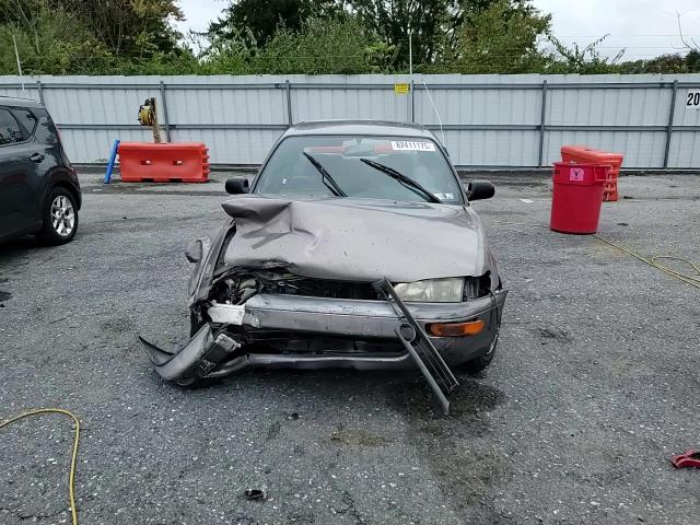 1995 Toyota Corolla Le VIN: 2T1AE09B0SC122313 Lot: 82411175