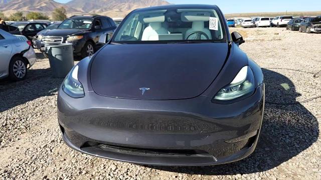 2023 Tesla Model Y VIN: 7SAYGAEE9PF846294 Lot: 84985295
