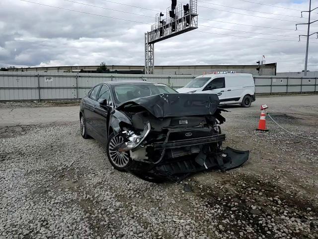 2014 Ford Fusion Titanium VIN: 3FA6P0K9XER106597 Lot: 89731095
