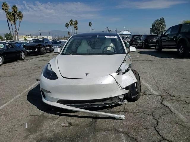 2023 Tesla Model 3 VIN: 5YJ3E1EAXPF552056 Lot: 87196365