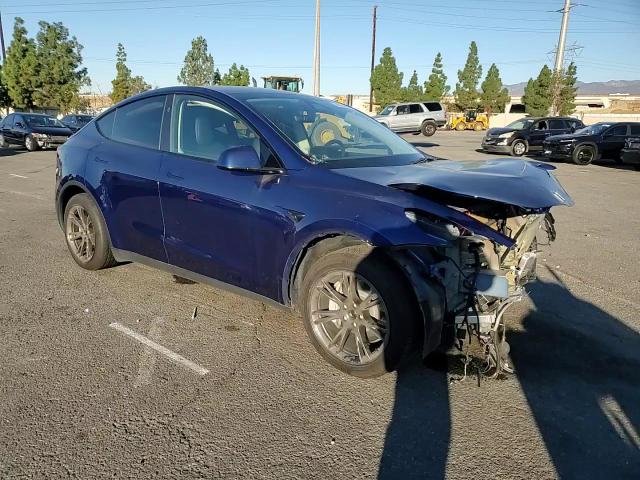 2024 Tesla Model Y VIN: 7SAYGDED2RF197207 Lot: 86707025