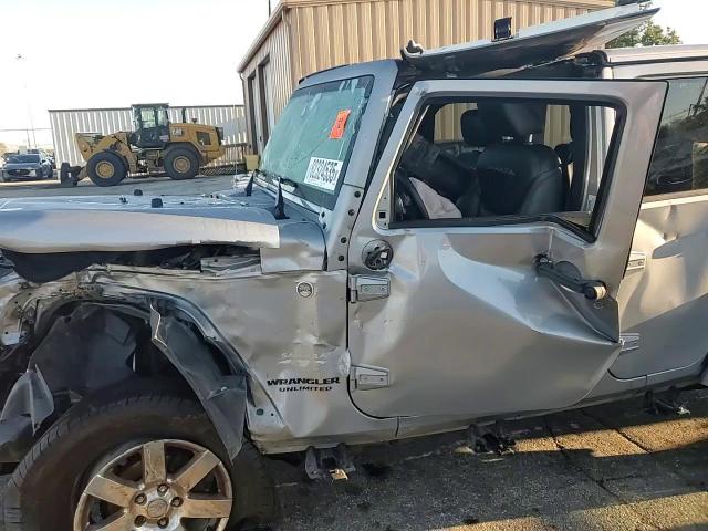 2015 Jeep Wrangler Unlimited Sahara VIN: 1C4BJWEG8FL520713 Lot: 82324535