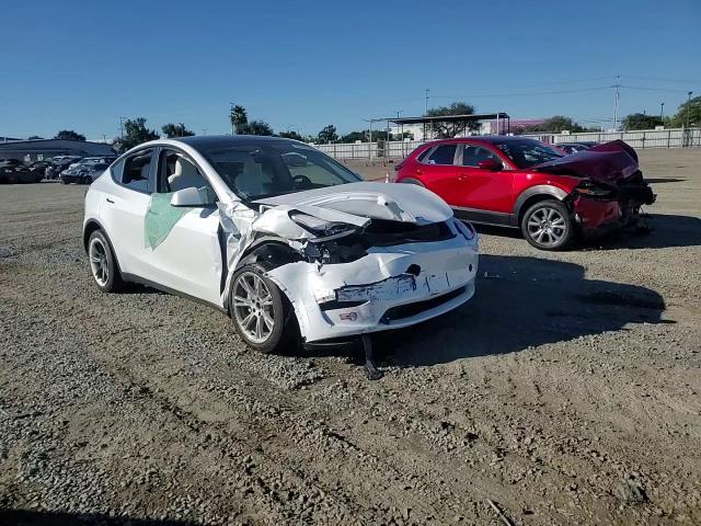 2023 Tesla Model Y VIN: 7SAYGDEE5PA111987 Lot: 87037045