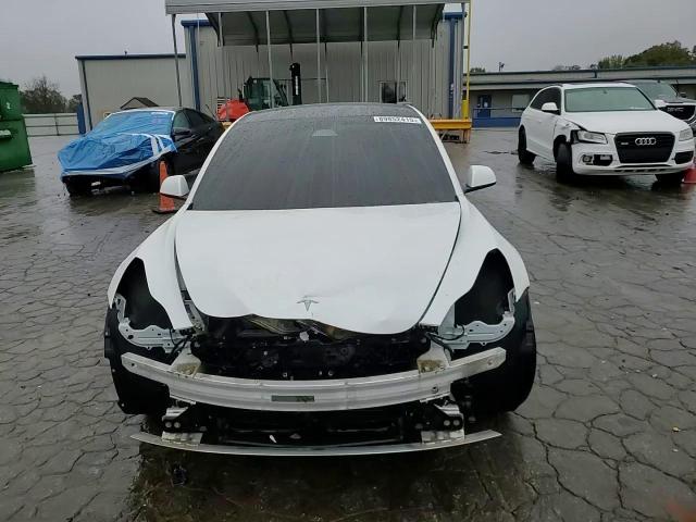 2021 Tesla Model 3 VIN: 5YJ3E1EA0MF991584 Lot: 89852415