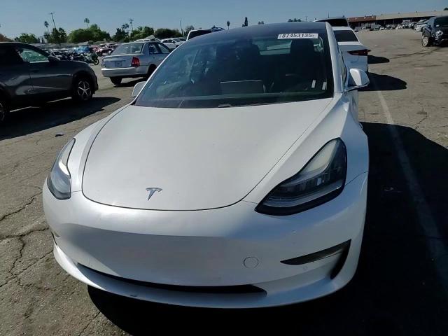 2019 Tesla Model 3 VIN: 5YJ3E1EAXKF483409 Lot: 87453135